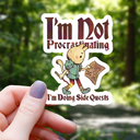 Mimic Gaming Co - Cat Doing Side Quests Funny Sticker - 3"